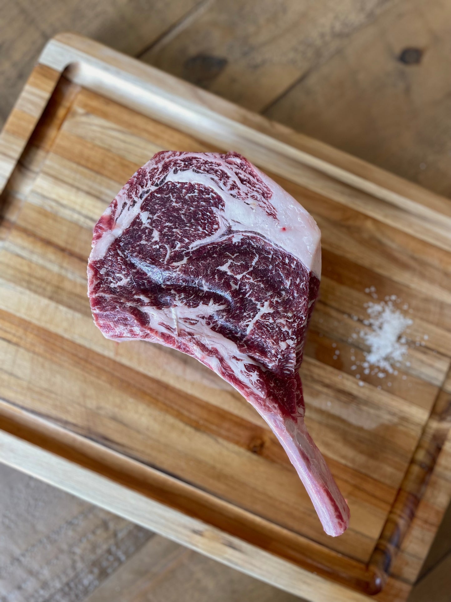 Elkins Cattle Co. grass-fed Cowboy Steak with natural marbling