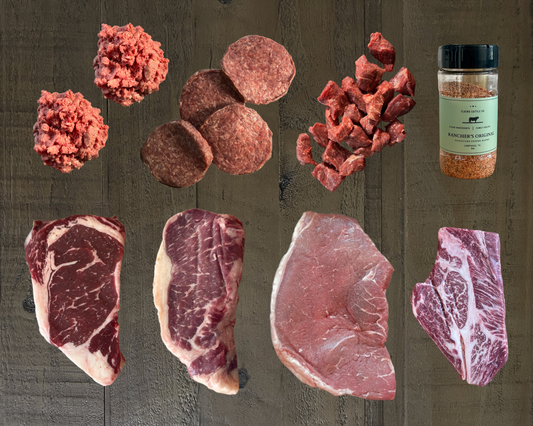 Elkins Grass-Fed Sampler Box with assorted grass-fed steaks, ground beef, and specialty cuts.
